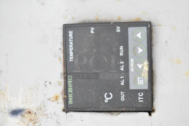 Close-up of an INKBIRD temperature control panel for a Cleveland KEL-100 100-gallon electric kettle.