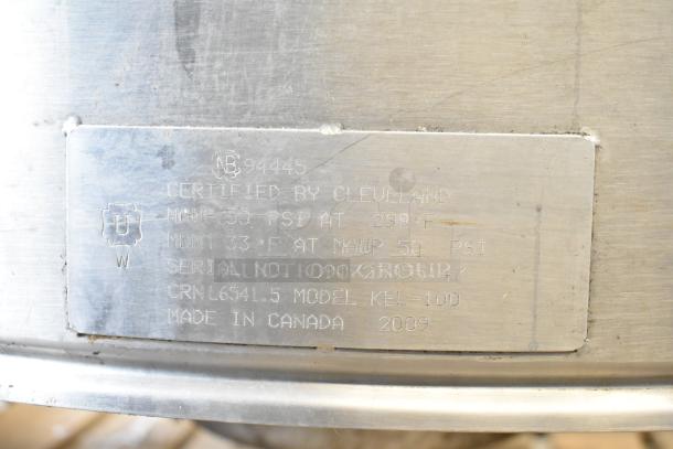 Cleveland KEL-100 electric kettle label. Certified 50 PSI at 298°F. Serial No. 090723055147. Made in Canada, 2009.
