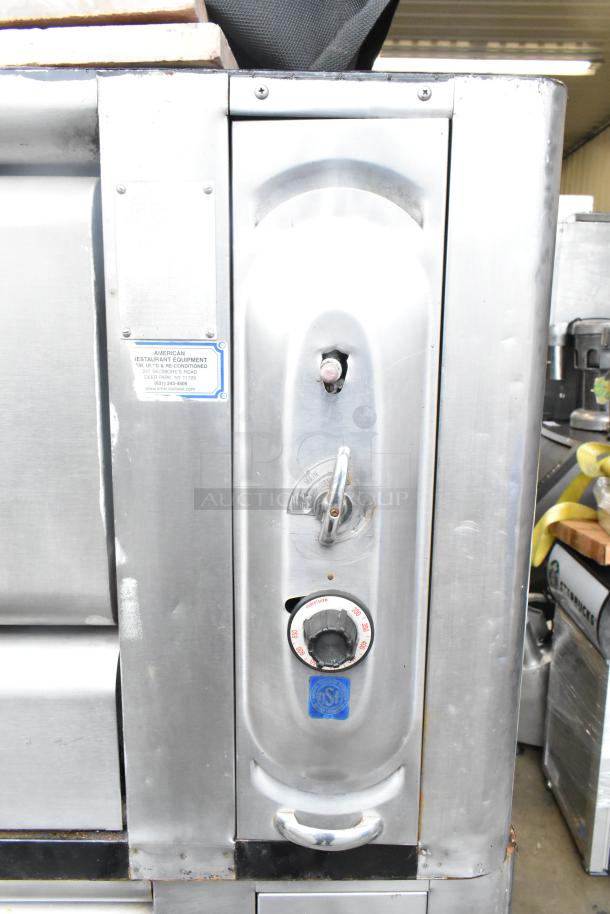 Commercial gas-powered single burner pizza oven with cooking stones, stainless steel, used condition, NSF certified.