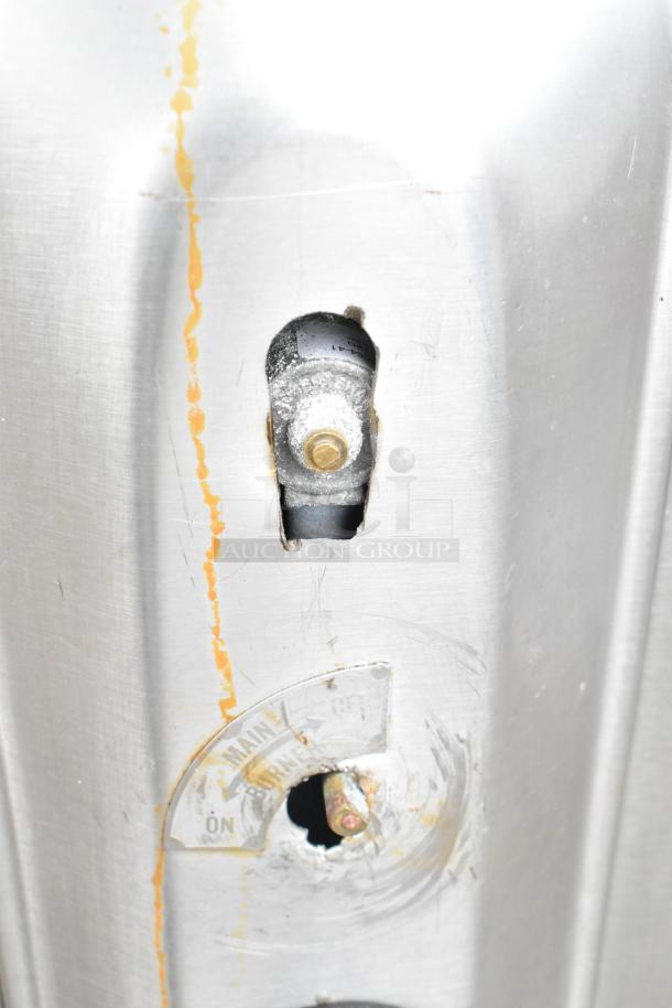 2 gas-powered single burner pizza ovens with cooking stones, commercial use. Features metal finish, dial markings "Main Burner ON."