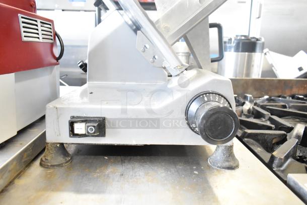 2024 Backyard Pro 551SL112E Countertop Meat Slicer, 115 Volts, 1 Phase, sturdy design, used condition, visible control knobs.