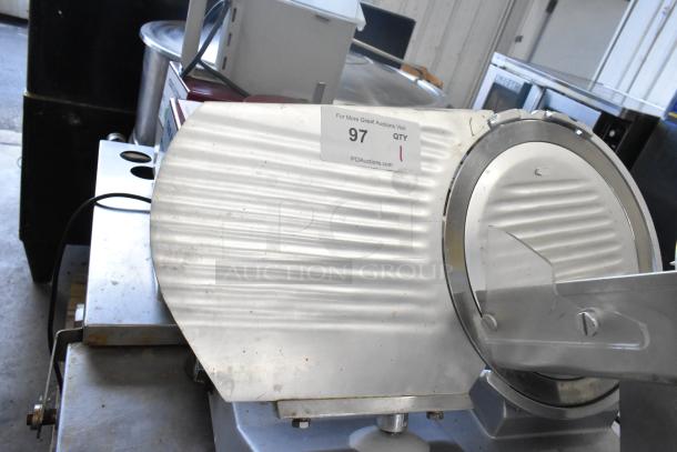 2024 Backyard Pro 551SL112E countertop meat slicer, 115 volts, 1 phase, with visible auction tag.