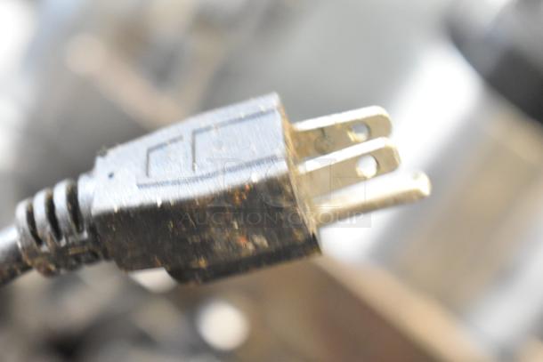Close-up of a power plug for the Backyard Pro 551SL112E countertop meat slicer, 115 volts, 1 phase.
