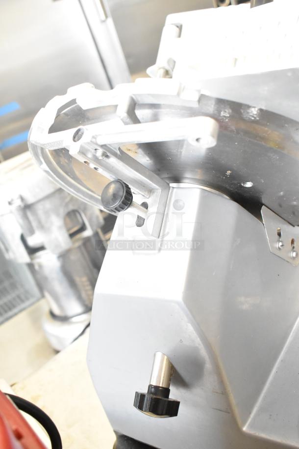 2024 Backyard Pro 551SL112E countertop meat slicer, 115 Volts, 1 Phase, in excellent condition with adjustable knobs.