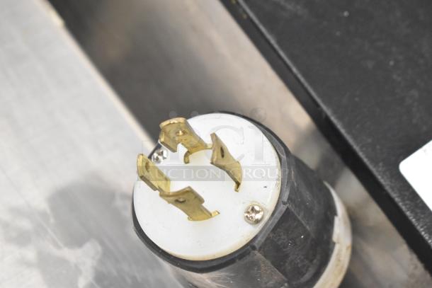 Close-up of electrical connector for a 2018 Bunn DUAL TF DBC coffee machine, showing socket configuration.