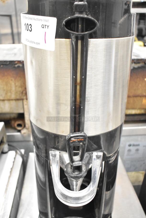 Bunn TF SERVER Beverage Holder Dispenser, stainless steel, labeled for quantity, black and silver design, good condition.