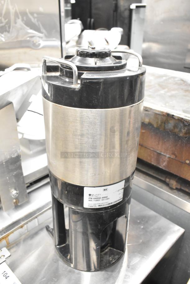 Bunn TF SERVER Beverage Dispenser, stainless steel, visible label with model info, sturdy handles, used condition.