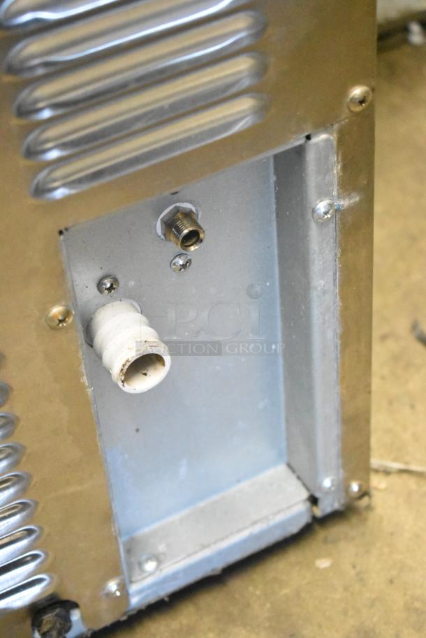 2021 All Pro AZ-20D undercounter ice machine backside, showing connection ports; good condition, 115 volts, 1 phase.