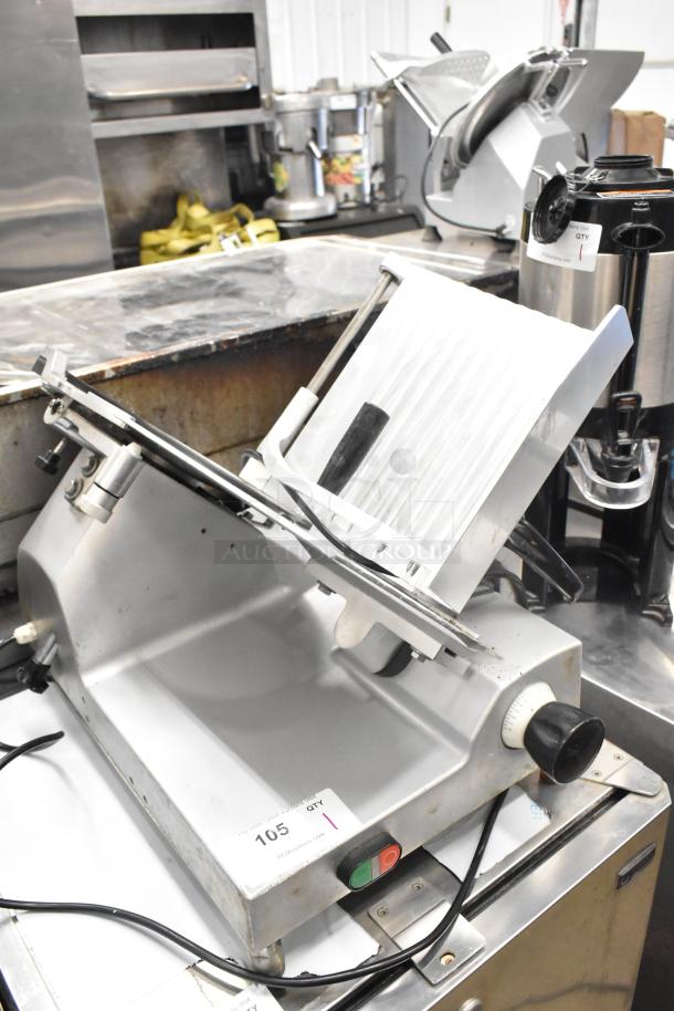 Avantco Commercial Countertop Meat Slicer, 115 Volts, 1 Phase, used condition, visible control knobs and markings.