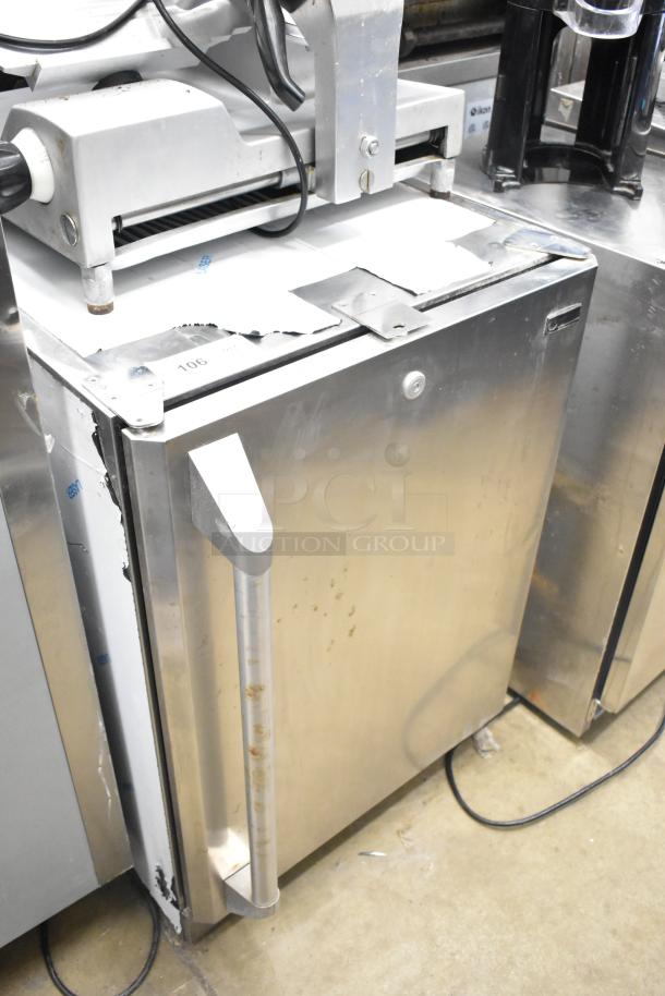 General Electric GE ZDOD240PASS Monogram undercounter cooler, stainless steel, single door, visible wear, 115V, 1 Phase.