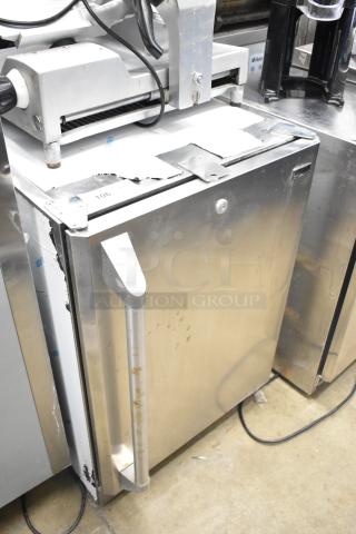 General Electric GE ZDOD240PASS Monogram undercounter cooler, stainless steel, single door, visible wear, 115V, 1 Phase.