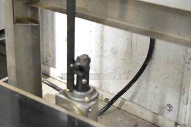 2019 Cleveland countertop continuous band sealer, 110 volts, 1 phase, shown in industrial setting.