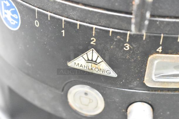 Mahlkonig K30ES/12 commercial espresso bean grinder, no lid, 115 volts, 1 phase, visible logo, close-up dial view.