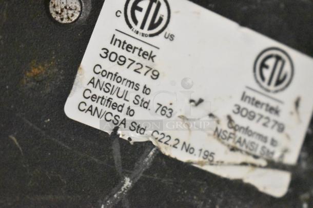 Label on Mahlkonig K30ES/12 espresso grinder, showing Intertek certification and compliance with ANSI/UL and CAN/CSA standards.