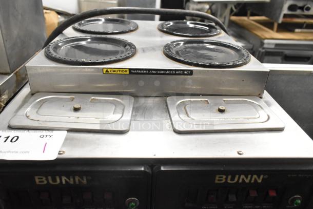 Bunn CWTF 4/2 TWIN commercial coffee machine with 6 burners, stainless steel, caution label, used condition. 120/240V, 1 phase.