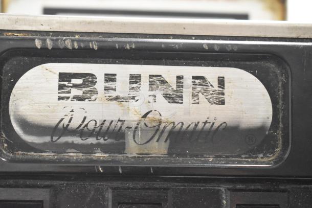 Bunn countertop coffee machine with 3 burners, visible Bunn logo. Used condition with surface wear. 15 Volts, 1 Phase.