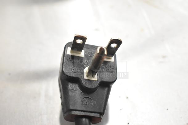 Power plug of Panasonic NE-17523 Commercial Microwave, showing three-prong design. Suitable for 208/240 volts.