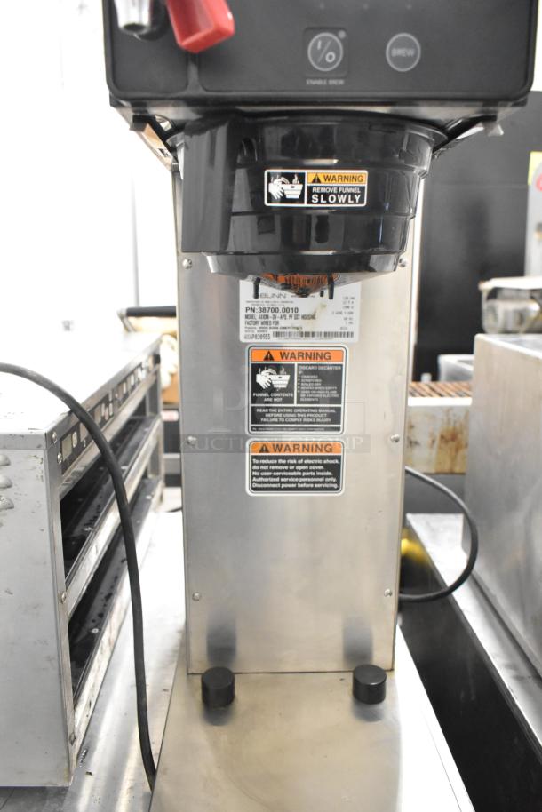 2018 Bunn AXIOM-DV-APS commercial coffee brewer with hot water dispenser, stainless steel, warning labels visible.