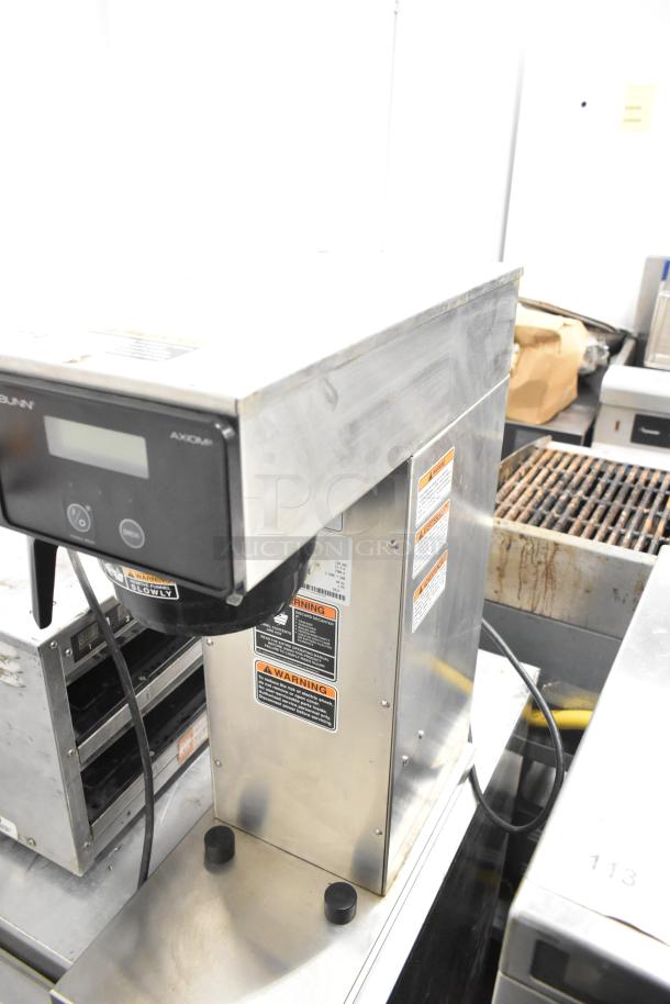 2018 Bunn AXIOM-DV-APS commercial coffee brewer with hot water dispenser, stainless steel, 120V, 1 Phase. In used condition.