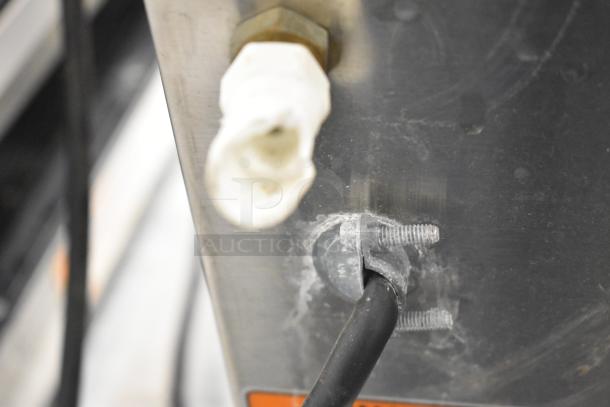Close-up view of cable and connector on a 2018 Bunn AXIOM-DV-APS coffee brewer. 120 Volts, 1 Phase.