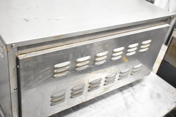 Carter Hoffmann MC212S commercial holding bin, stainless steel, countertop model. Ventilated panel, visible wear. 120V, 1 Phase.