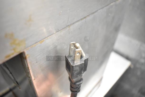 Alt text: Avantco 178SS1RHC single door reach-in cooler with power plug shown, 115V, on commercial casters, in stainless steel.