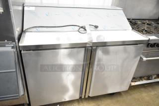 Brand new 2022 Kutano JUT 2 4D PT prep table, commercial casters, stainless steel, scratch and dent, 115V, 1 phase.