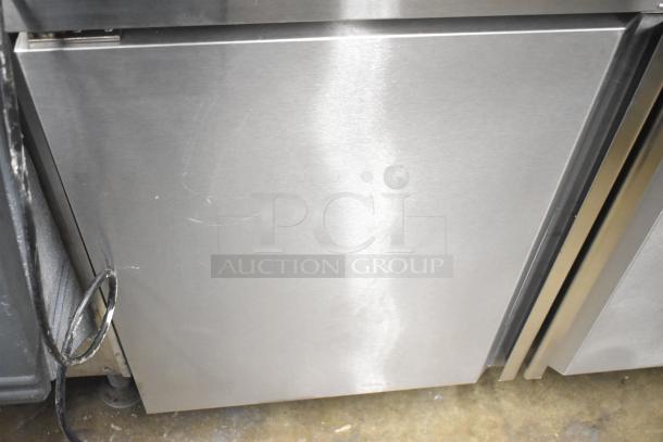 BRAND NEW 2022 Kutano JUT 2 4D PT Commercial Prep Table with minor scratches. Mega top, 115V, on commercial casters.