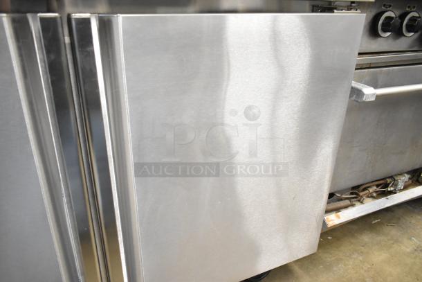 Brand new 2022 Kutano JUT 2 4D PT sandwich salad prep table. Scratch and dent, on commercial casters, 115V, 1 phase.