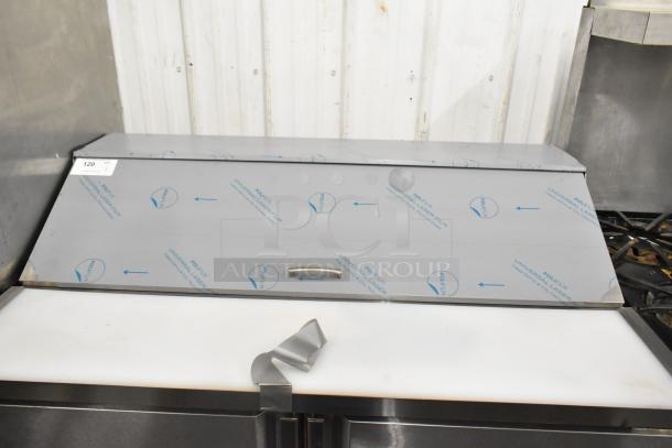 Brand new 2022 Kutano JUT 2 4D PT sandwich salad prep table, scratch and dent condition, on casters, 115V, 1 phase.