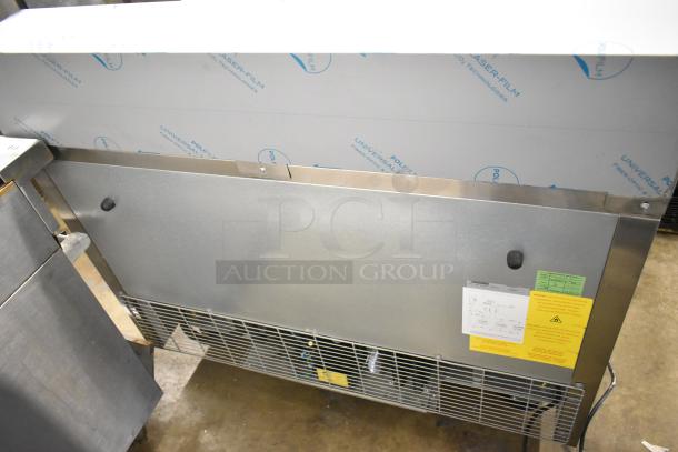 Brand new 2022 Kutano JUT 2 4D PT commercial prep table, scratch and dent, 115V, 1 phase, on commercial casters.