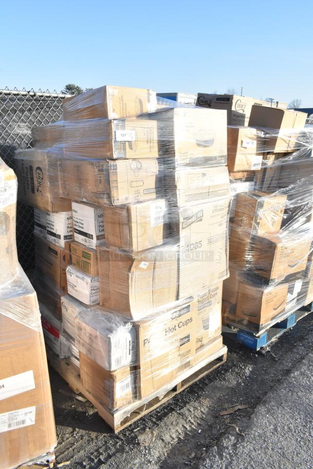 Pallet of 24 new scratch and dent items, including hot cups, paper towels, and anti-fatigue mats, wrapped in plastic.