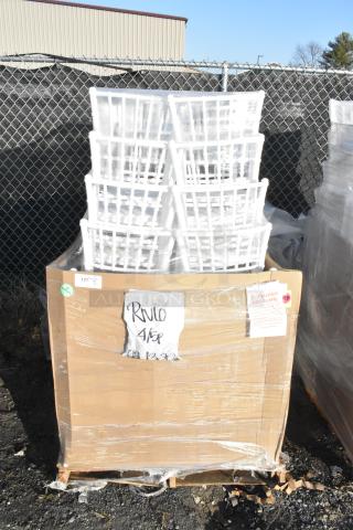Stack of Lancaster white resin Chiavari chairs in scratch and dent condition, wrapped on a pallet, marked "RULO 4/5p".