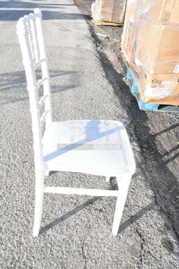 White resin Chiavari chair by Lancaster Table & Seating. Brand new, slight scratch and dent condition. Durable and stylish.