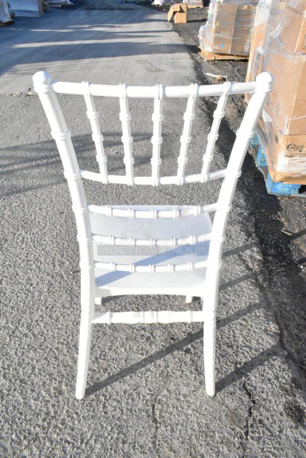 White Lancaster Table & Seating Resin Chiavari Chair, scratch and dent condition, set of 20, durable and stylish design.