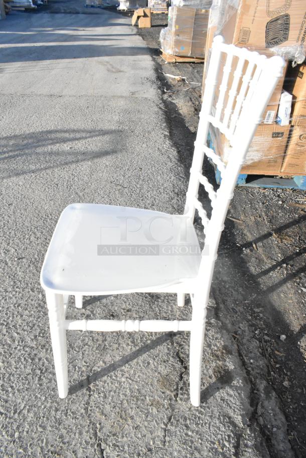 White resin Chiavari chair by Lancaster Table & Seating. New condition. Ideal for events. Scratch and dent discount available.