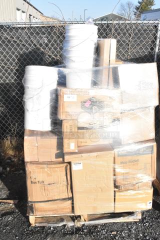 Pallet with 40 new scratch and dent items including Taco Cup Fry Basket, Wire Whip, and Charger Plate in boxes and buckets.
