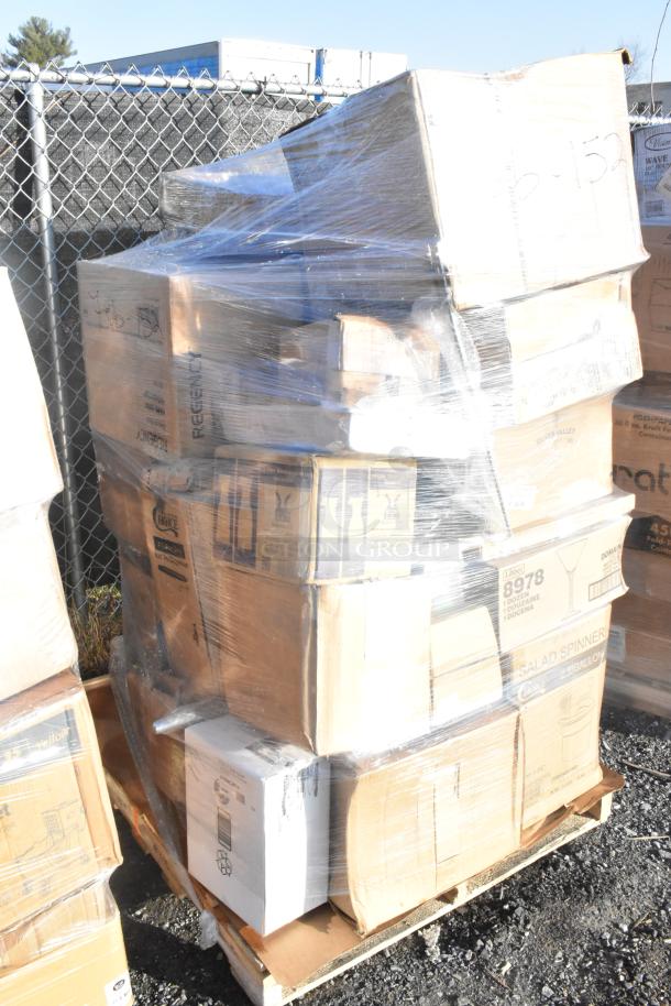 Pallet with 30 boxes labeled scratch and dent, including mixing bowl, martini glasses, and mandolin. Wrapped in plastic.