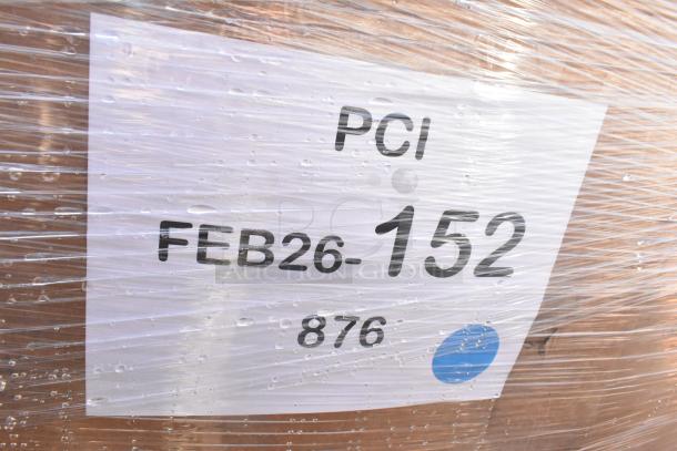 Wrapped auction items labeled "PCI FEB26-152 876," include mixing bowl, martini glasses, mandolin; scratch and dent.