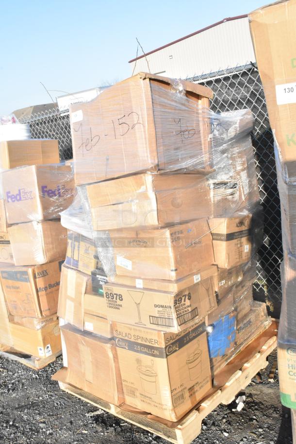 Pallet of boxed items including mixing bowl, martini glasses, and mandolin, labeled "FEB26-152," scratch and dent condition.