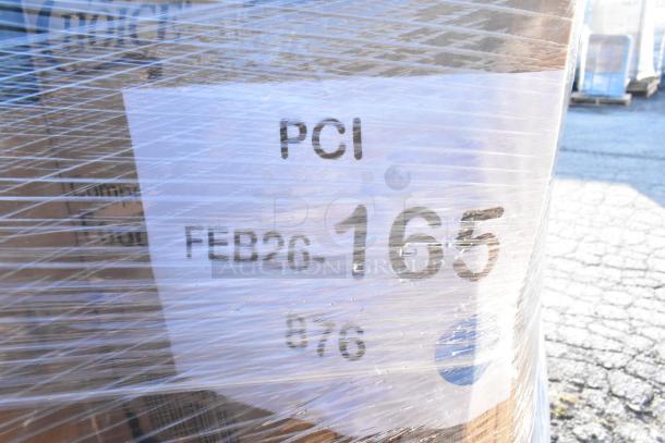 Plastic-wrapped pallet labeled "PCI FEB26-165," containing 29 new scratch and dent items like can liners and gloves.