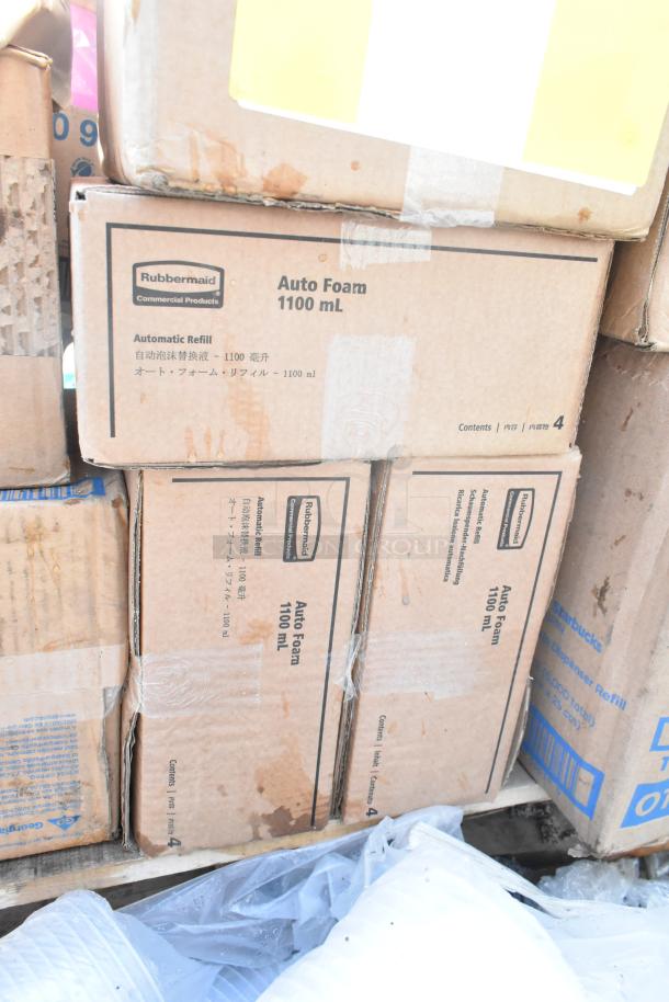 Boxes labeled "Rubbermaid Auto Foam 1100 mL" stacked, new condition with minor scratches and dents.