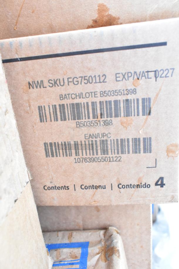 Cardboard box with SKU FG750112, batch B503551398, and EAN/UPC 10763905501122 visible, containing scratch and dent items.