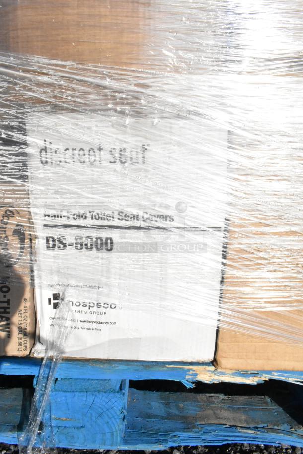 Box of HOSPECO toilet seat covers, model DS-5000, wrapped in plastic. Part of scratch and dent auction lot.