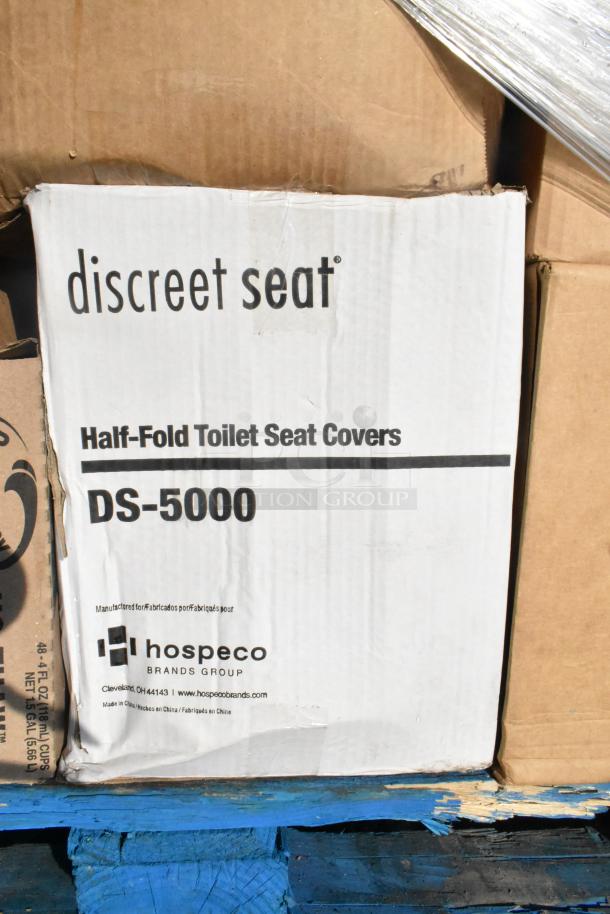 Cardboard box of Discreet Seat DS-5000 half-fold toilet seat covers by Hospeco Brands Group, mildly scratched.