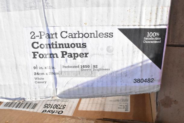 A box of 2-part carbonless continuous form paper, 1650 sheets, white canary, 9.5x11 inches, 100% satisfaction guaranteed.