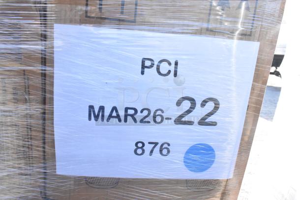 Pallet with "PCI MAR26-22" label, containing 33 new scratch-and-dent items like paper towels and plastic plates, wrapped in plastic.