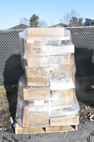 Pallet of 42 mixed new items, including martini glasses, pizza screens, and plates. Some boxes labeled "Aluminum Stock Pot."
