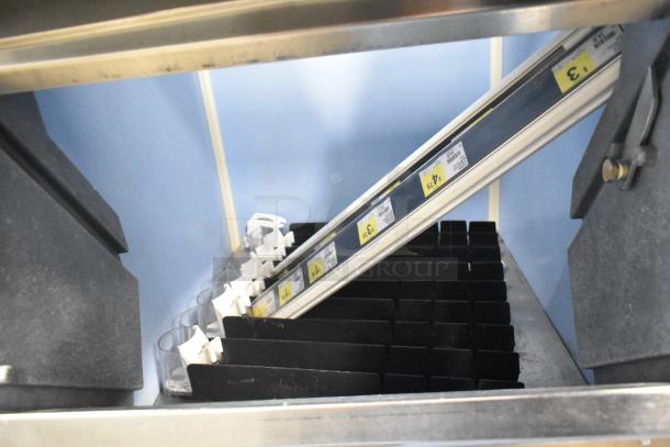 2019 Atosa YR800-AP-261 commercial ice maker on bin, cube style, 230V, 1 phase, shelves with pricing labels visible.