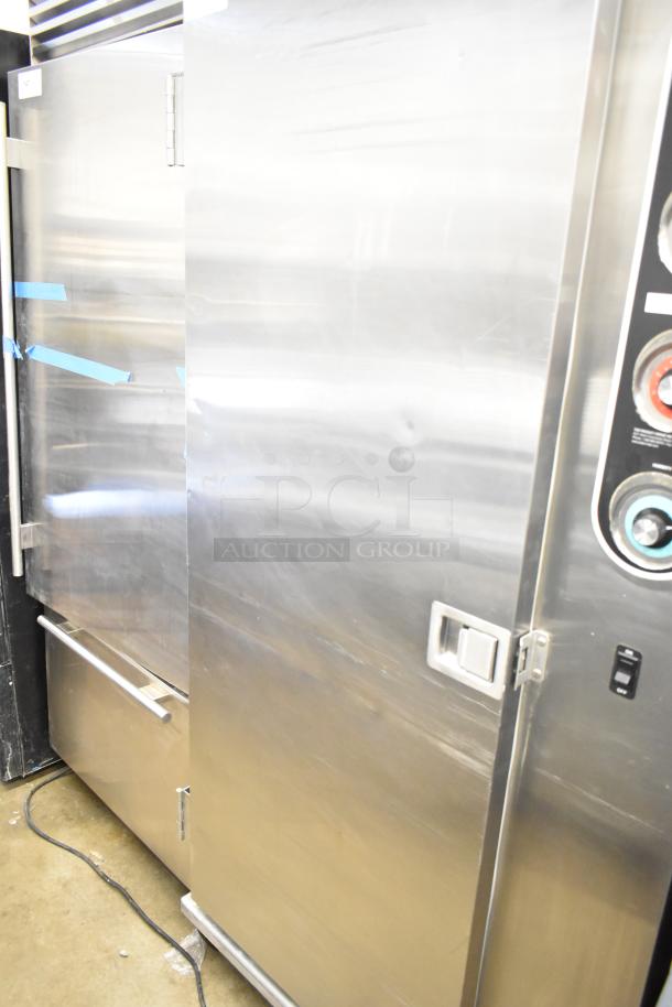 Plate Mate commercial heated holding cabinet with stainless steel exterior, on commercial casters. Features control panel.